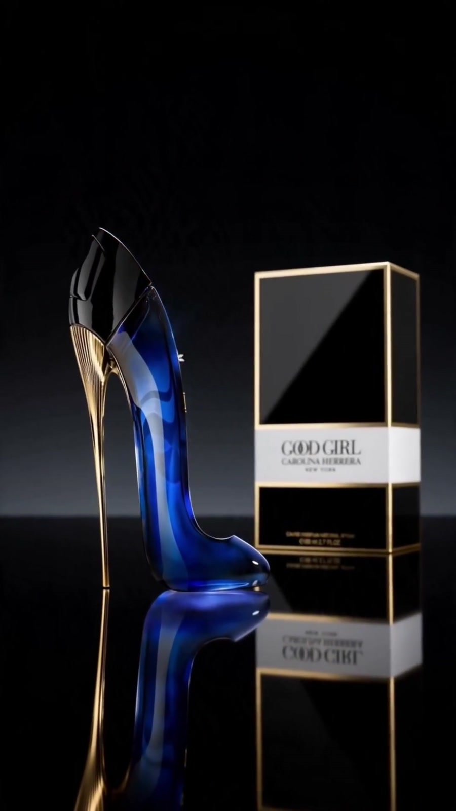 Blue stiletto fragrance bottle in a dark luxury product scene